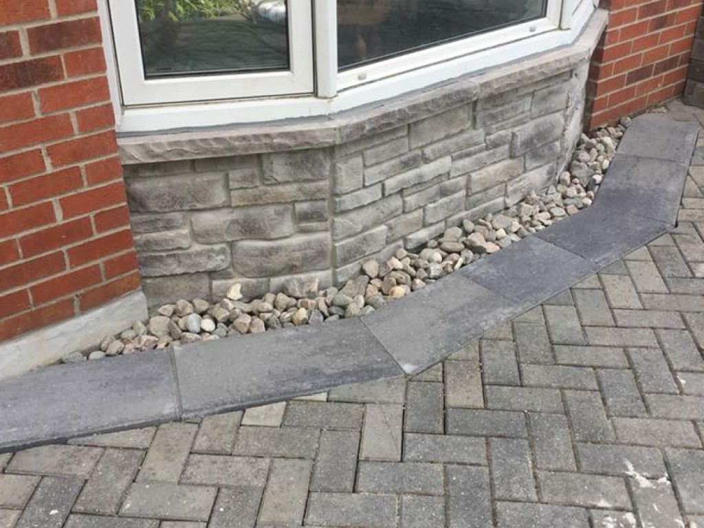 stones below bay window