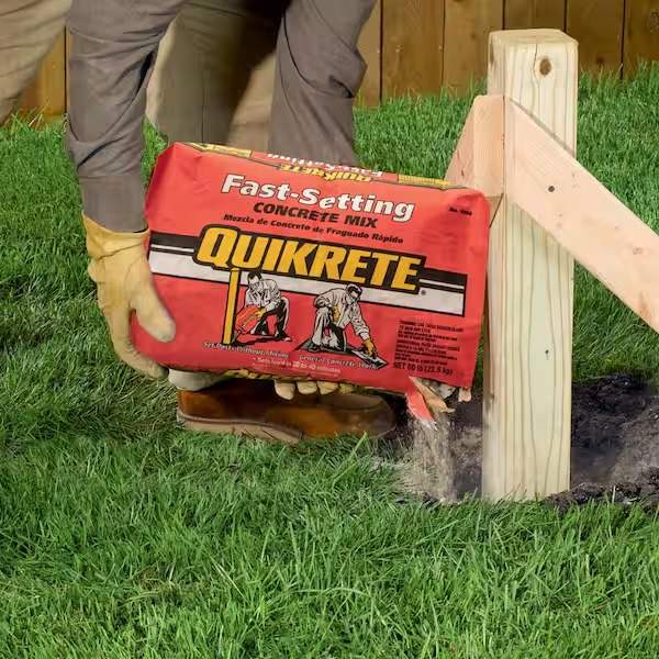 An Image showing Quikrete Fast Setting Concrete mix being used for fence post